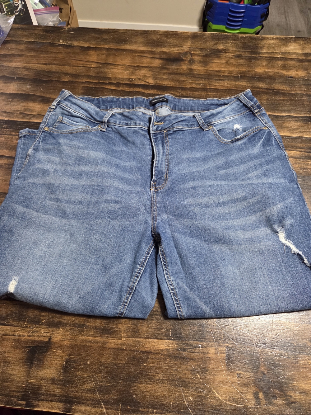 Women's Light Blue Distressed Denim Capris